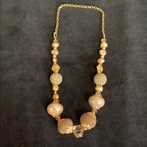 Gold Necklace with Unique Beads and Delicate Chain